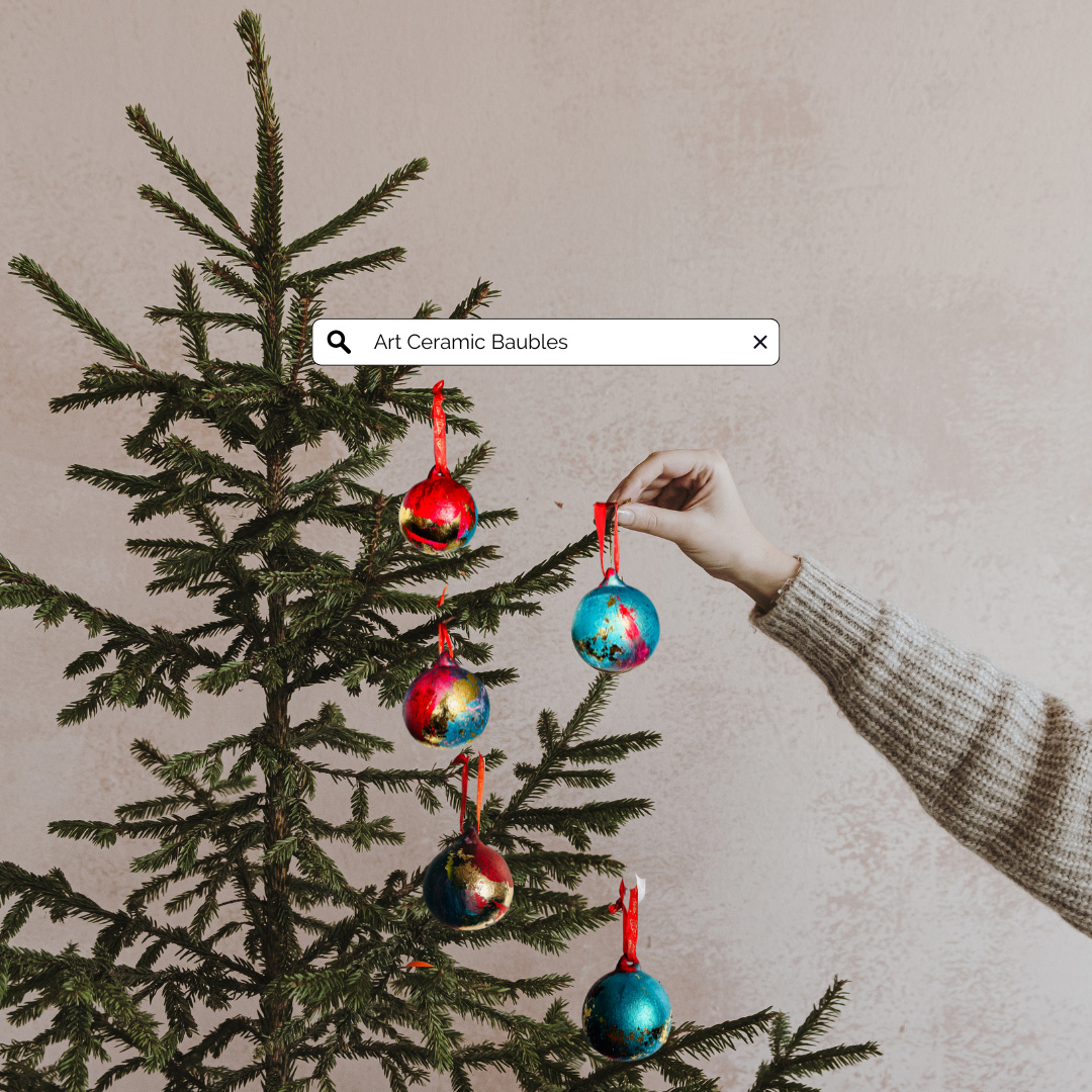 HAND PAINTED CERAMIC CHRISTMAS BAUBLE WITH GILDED GOLD LEAF