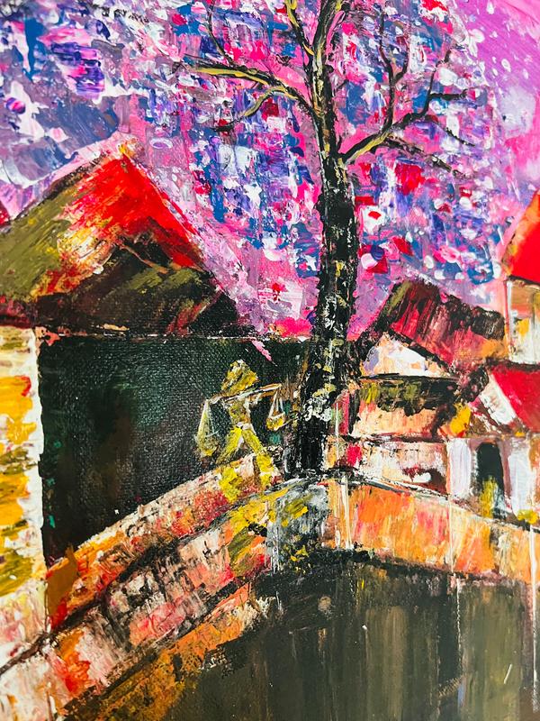 A6 greeting card featuring a textured, hand-painted scene of Hanoi’s old streets with vibrant pink trees and traditional architecture.