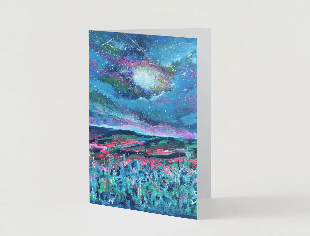 A6 folded greeting card featuring a vibrant, hand-painted night sky landscape with blue, pink, and purple starry textures.