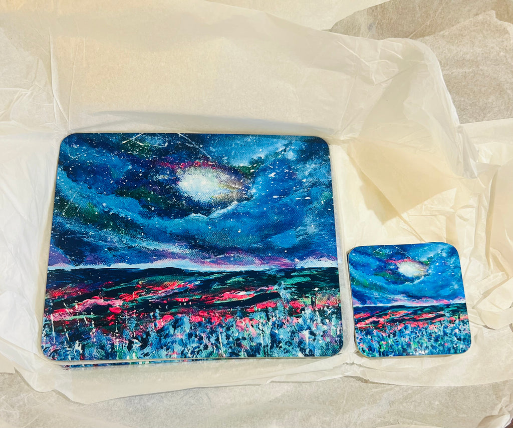 Glossy wooden placemat and coaster set featuring a vibrant blue night sky art print on durable hardboard.
