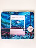 Packaged set of 4 wooden placemats with blue night-sky art print