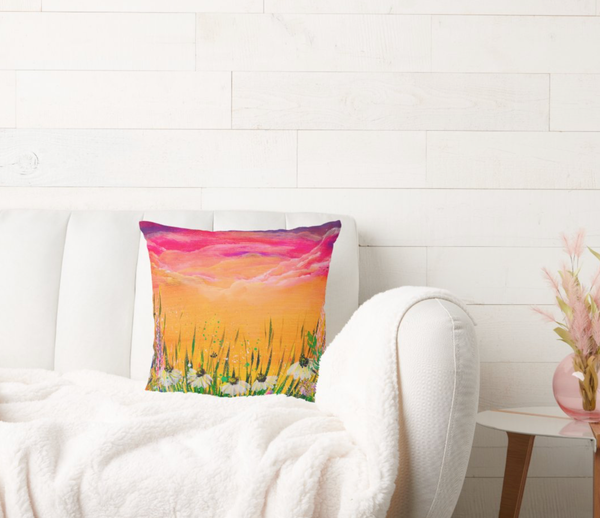 Decorative polyester cushion with sunset field landscape print, placed on a sofa