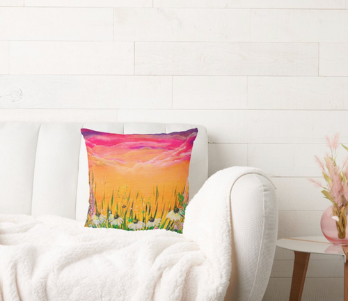 Decorative polyester cushion with sunset field landscape print, placed on a sofa