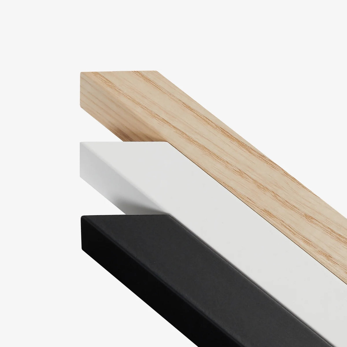 Picture frame rails in natural wood and dark black finish