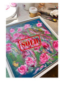 Framed pink roses floral painting on table with red "SOLD" stamp overlay