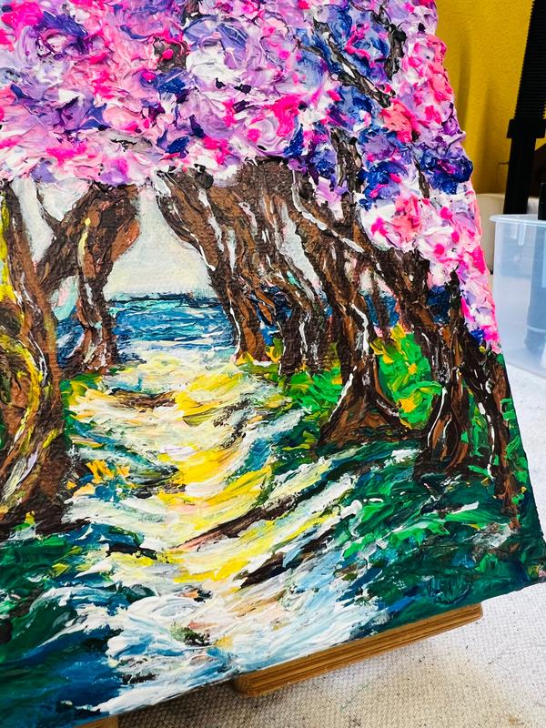 Close-up framed 3D texture artwork with yellow path, green foliage, and brown trunks