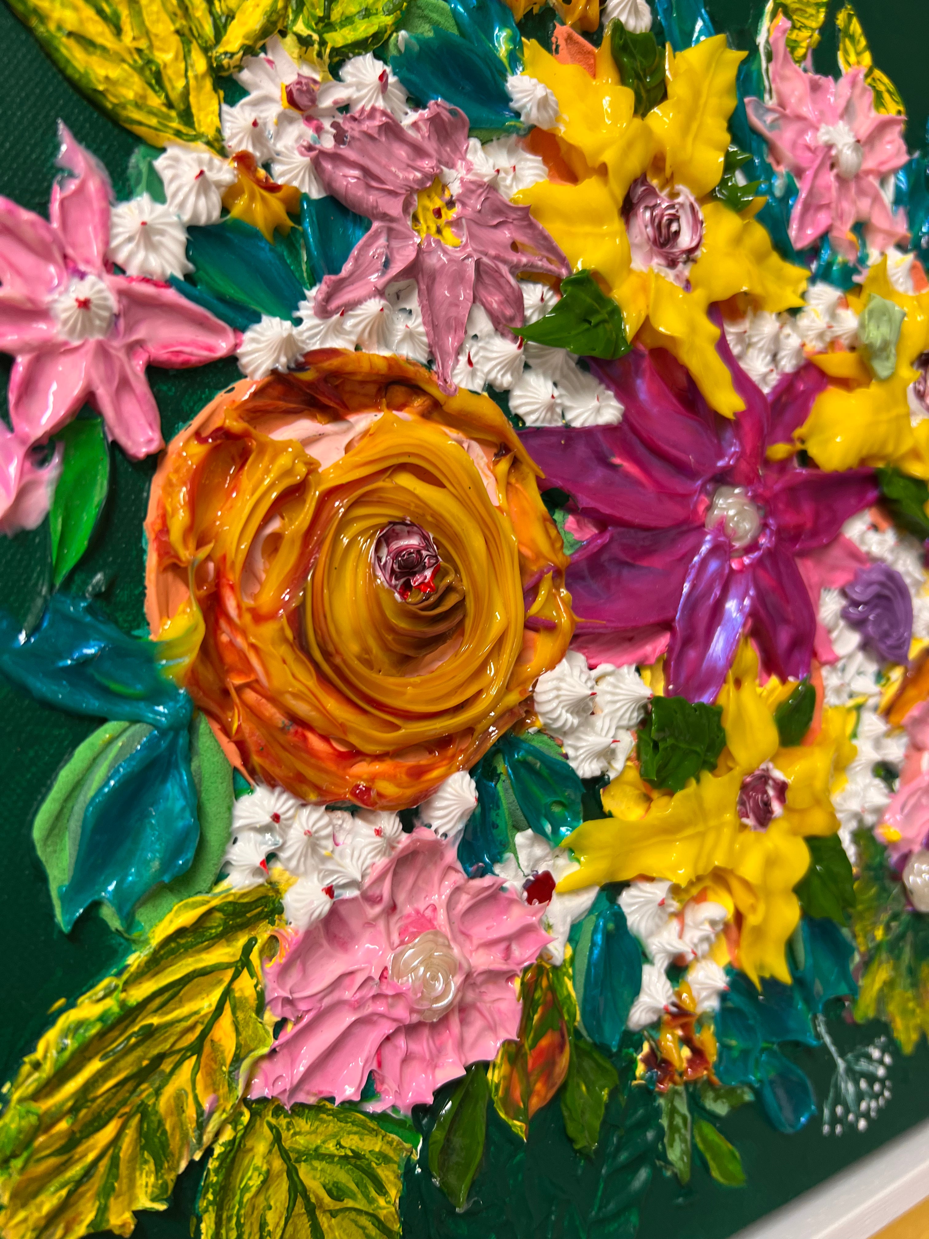 Square 3D floral wall art with orange spiral rose and pink, yellow, purple blossoms
