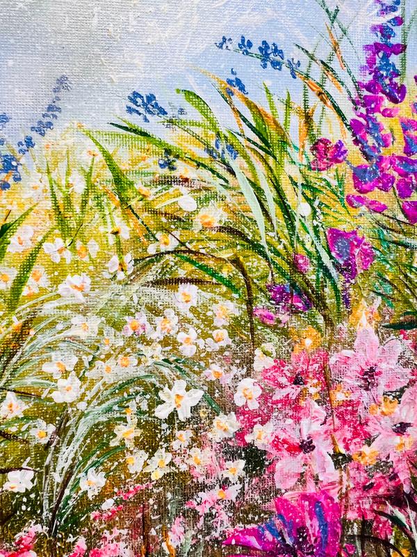 Wildflower canvas with dense pink flowers and purple spikes over green stems