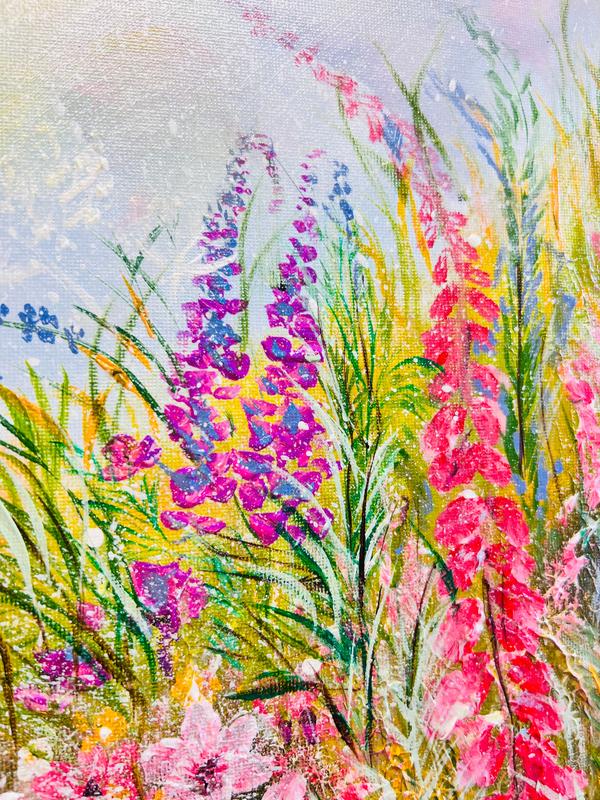 Wildflower painting with bright pink blossoms, blue spikes, and sunlit grass