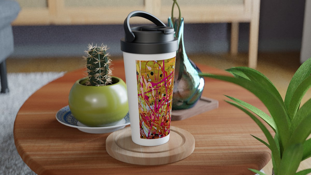 Leak-proof travel mug with plant artwork and black flip-top lid