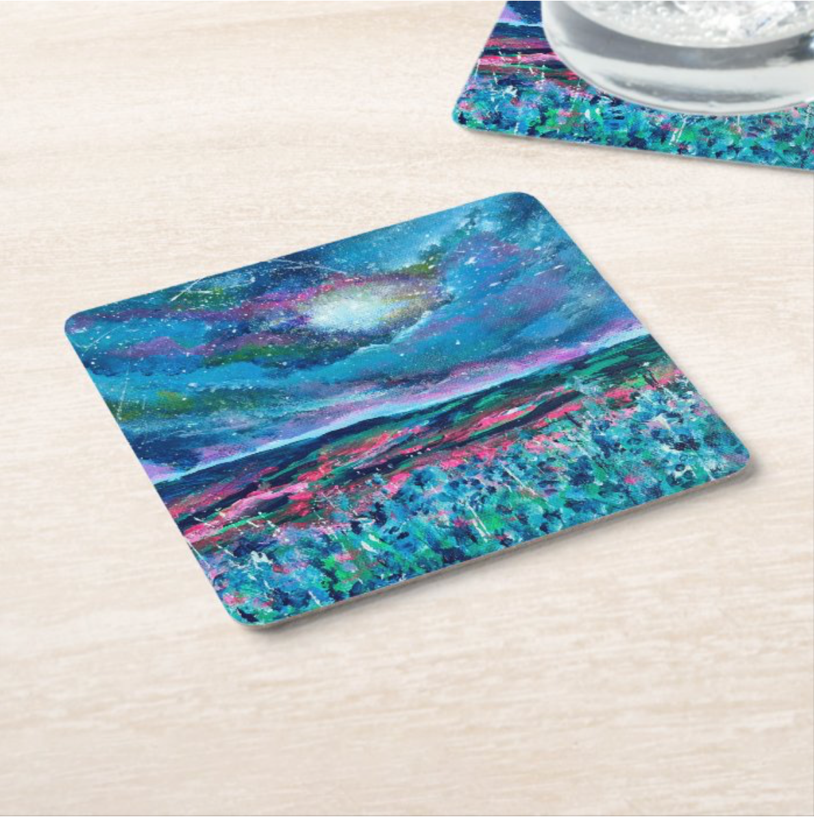 Flexible phone case with vivid blue, pink, and green landscape art print
