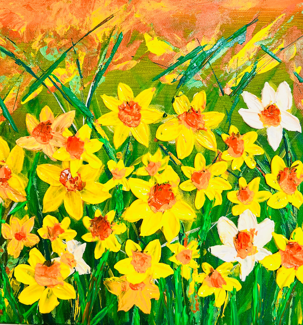 Framed daffodils floral print with yellow, orange, and white flowers on green background