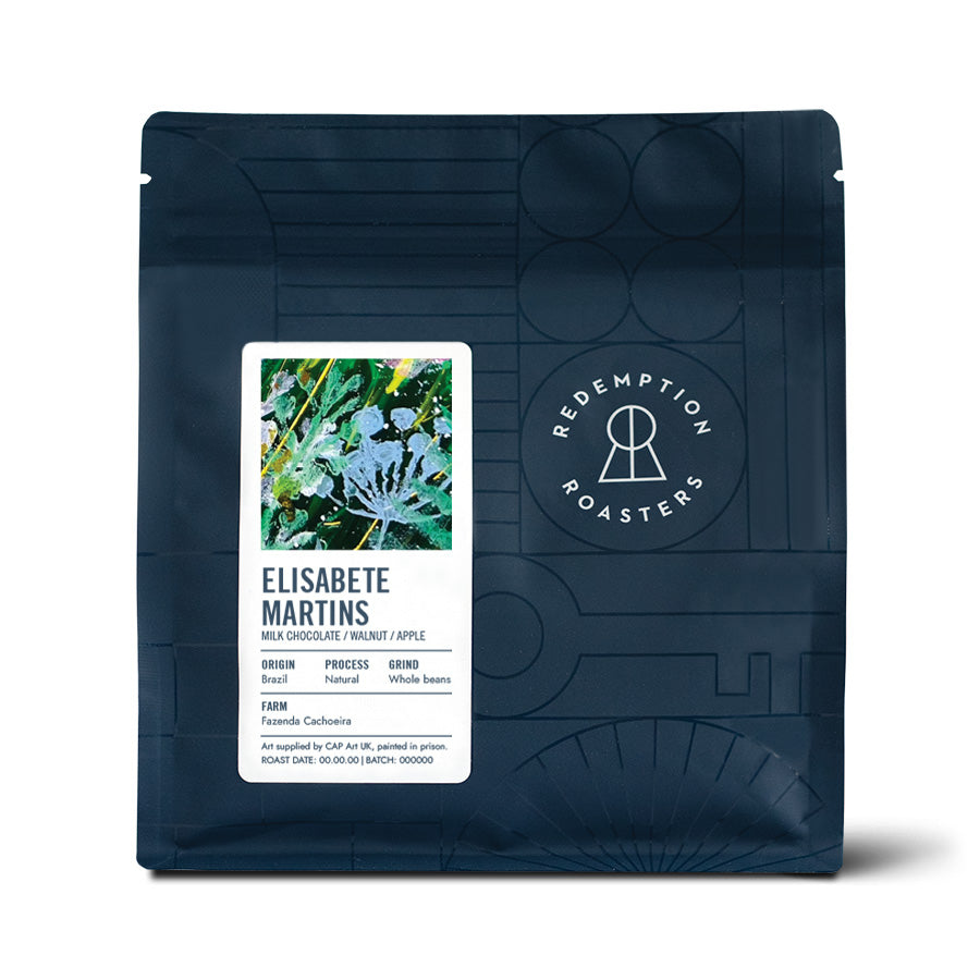 Dark blue coffee bag with ELISABETE MARTINS label, whole bean grind and artwork