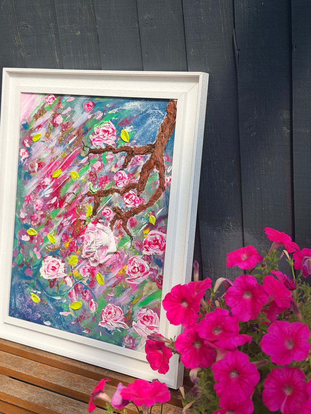 Framed textured rose painting with pink flowers and colorful brush splatter