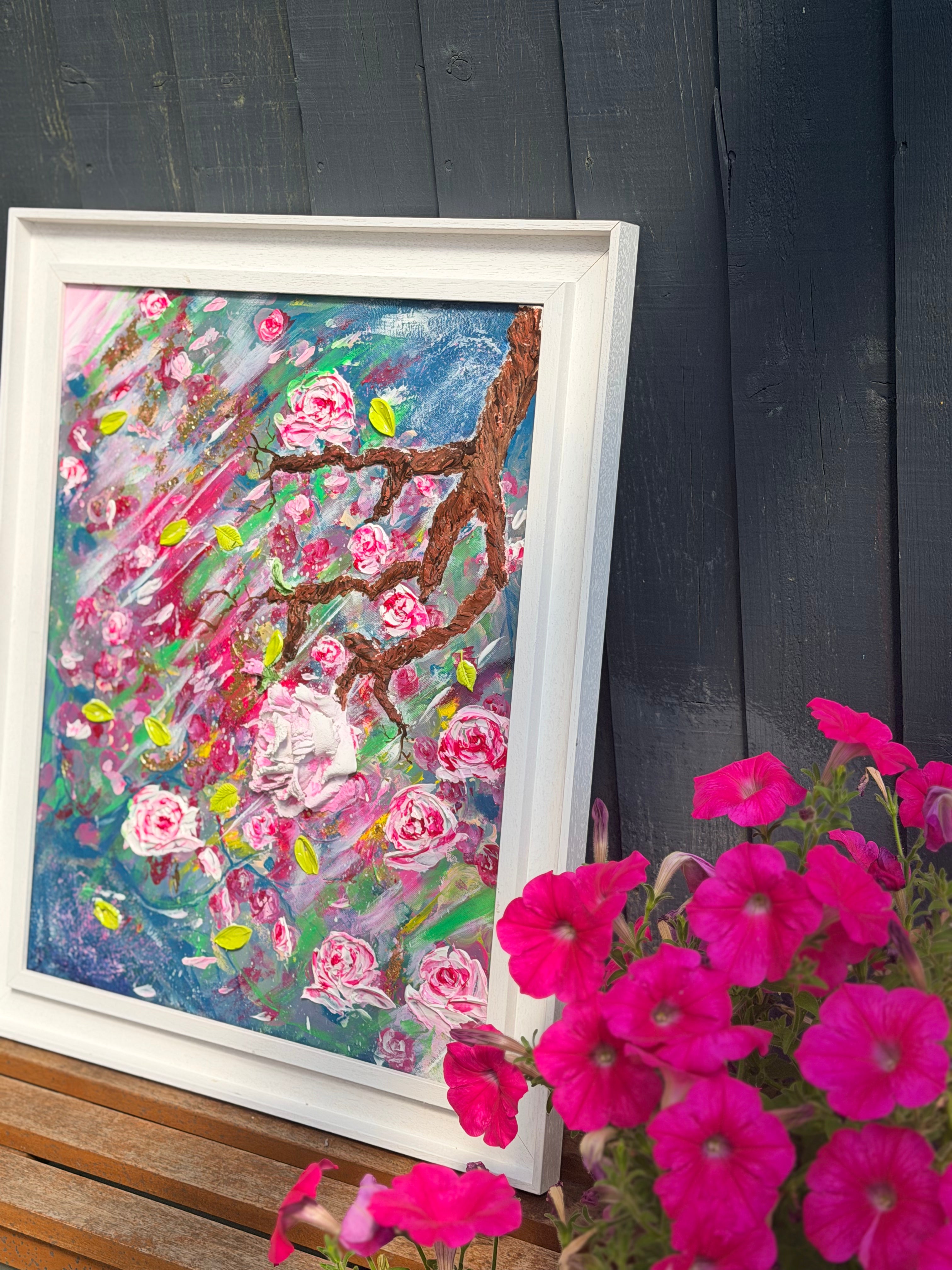 Framed textured rose painting with pink flowers and colorful brush splatter