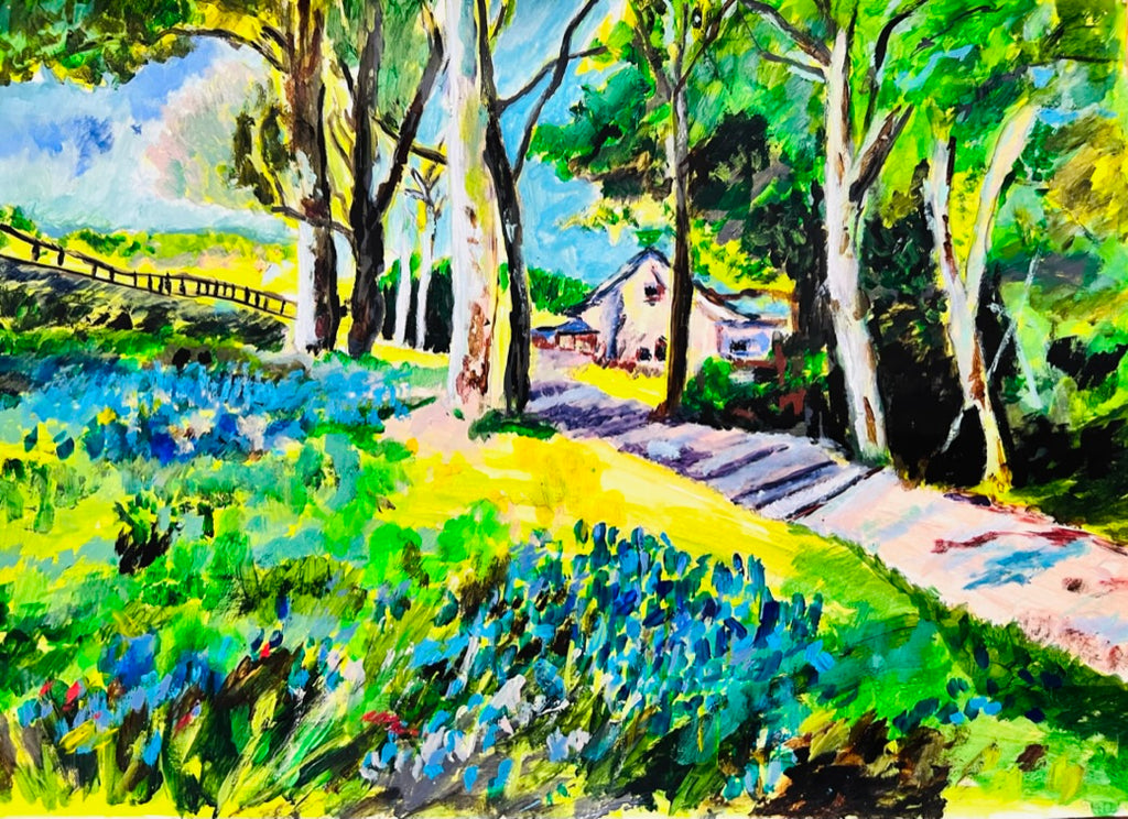 Framed watercolor landscape painting of bluebell flowers, trees, and a winding path