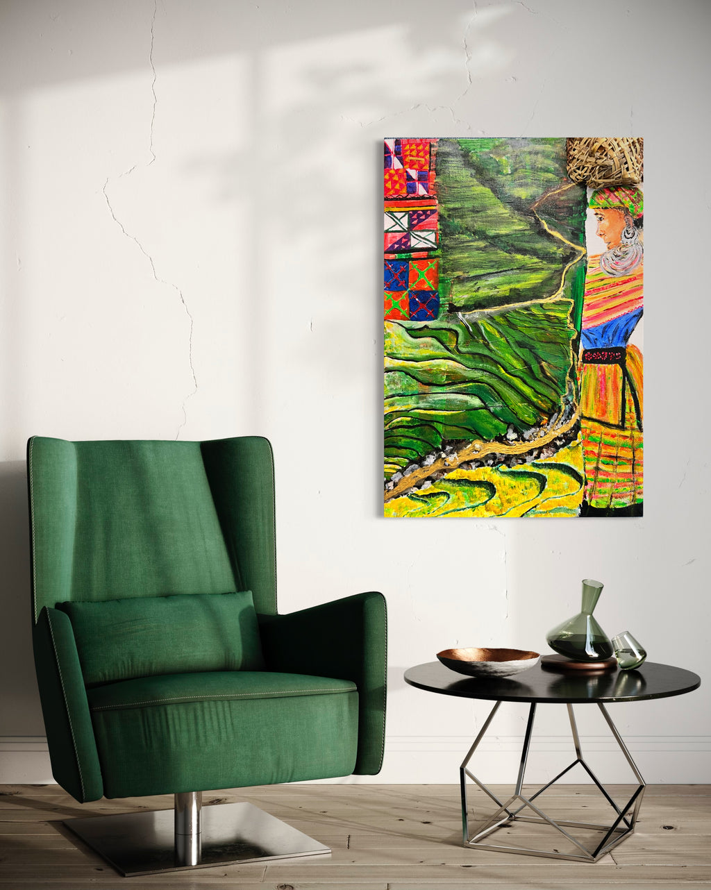Framed wall art with green rice terraces and a colorful robed woman portrait.