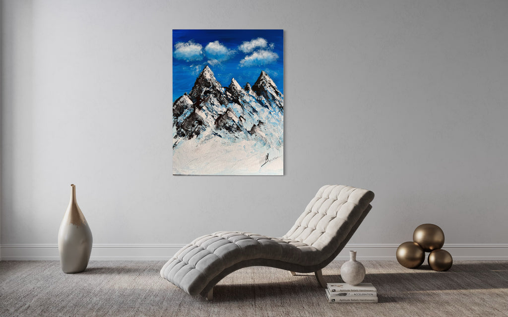 Snowy mountain landscape wall art with vivid blue sky, cloud texture, and dark rock peaks