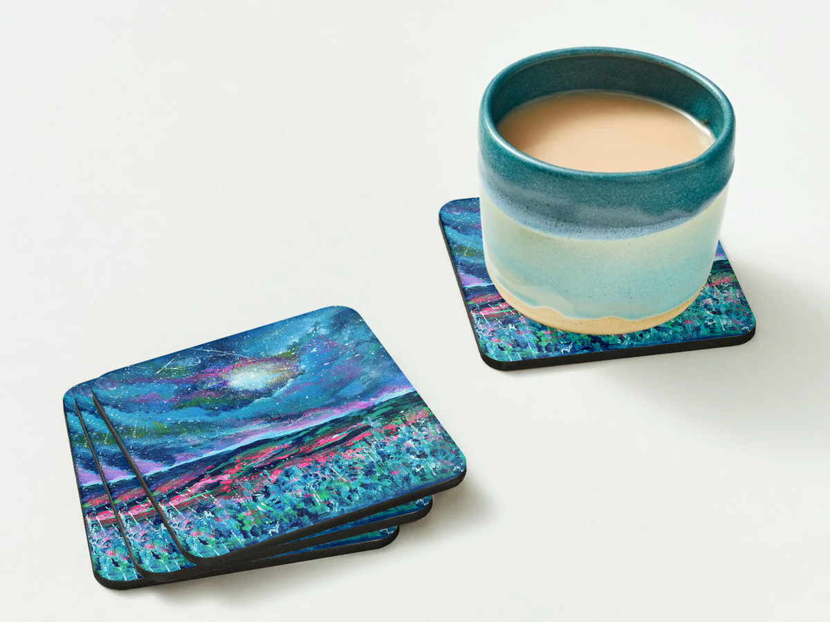 Square 9.5cm hardboard coasters with a glossy dark blue sky and wildflower print, featuring a cork back and a ceramic mug.