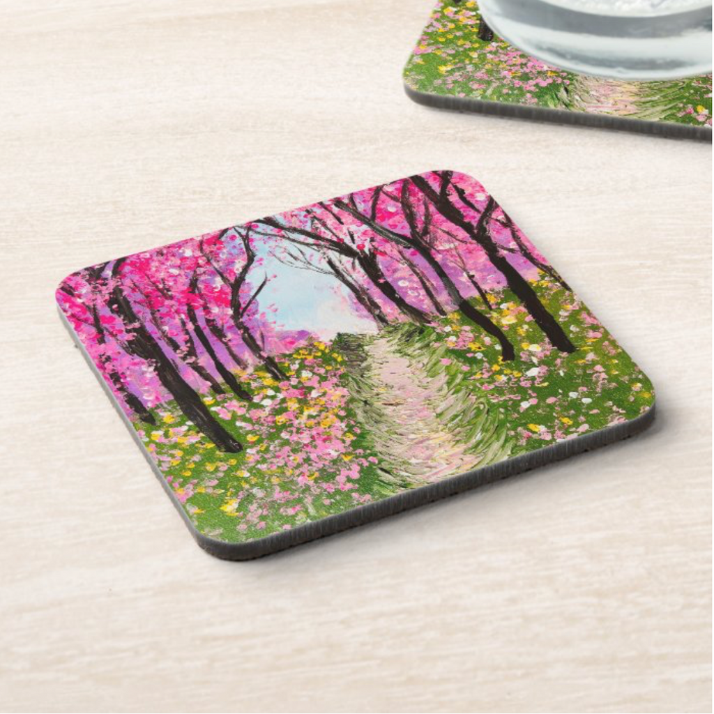 Glossy 9.5cm square hardboard coaster featuring a vibrant pink cherry tree walkway painting.