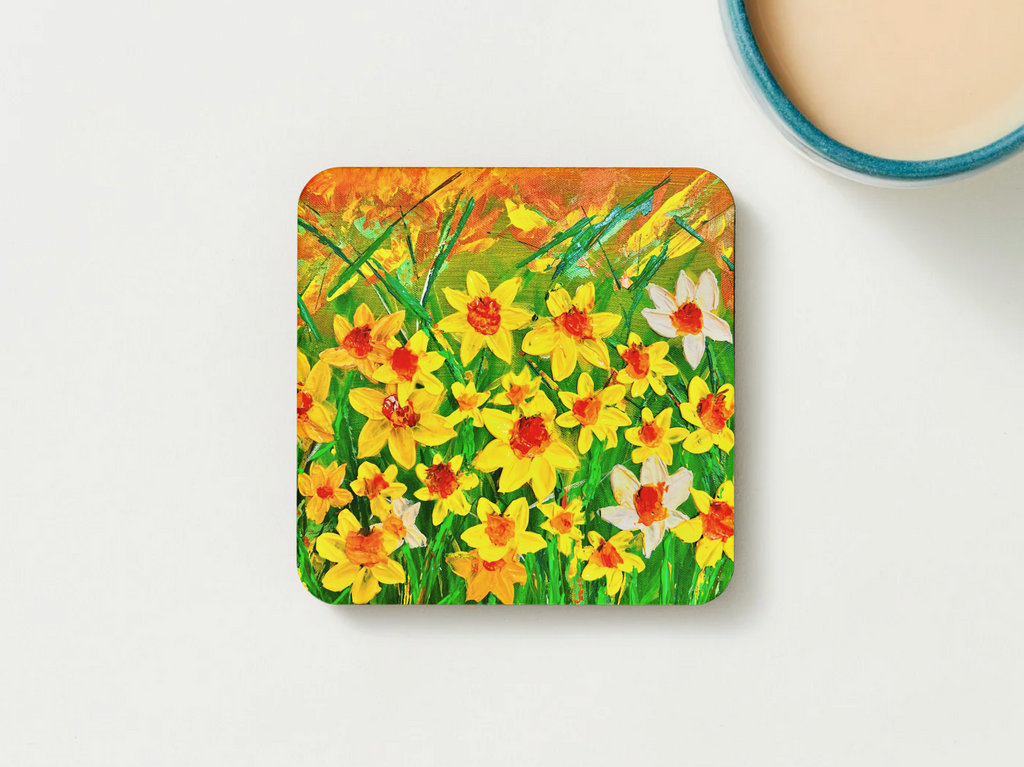 Square hardboard coaster with dense daffodil and green stem flower pattern