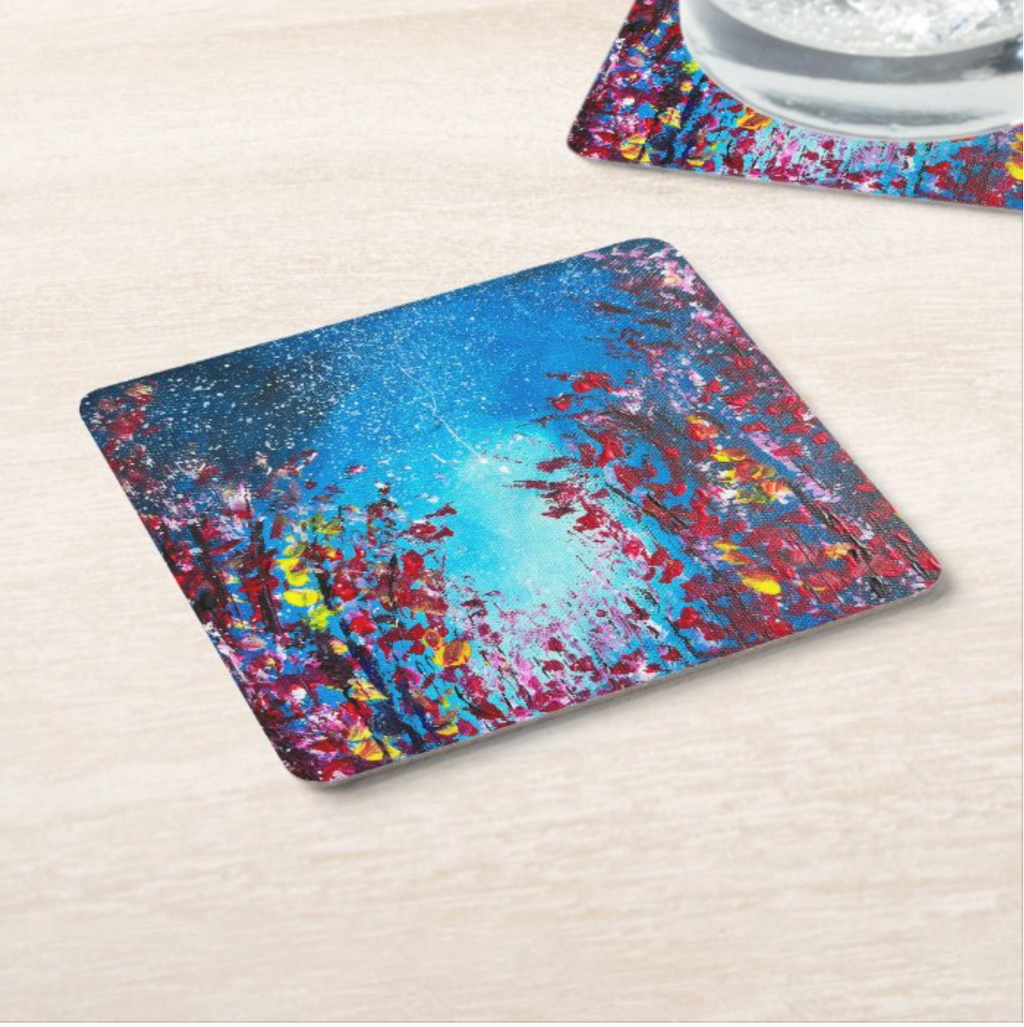 9.5cm square hardboard coaster with a glossy dark blue starry sky and vibrant floral acrylic painting design.