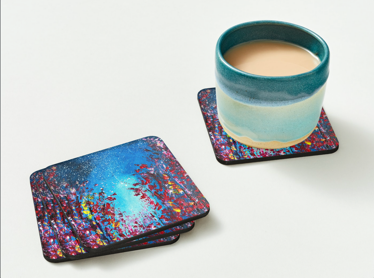 Square 9.5cm hardboard coaster with a glossy dark blue starry night and floral acrylic painting design under a ceramic mug.