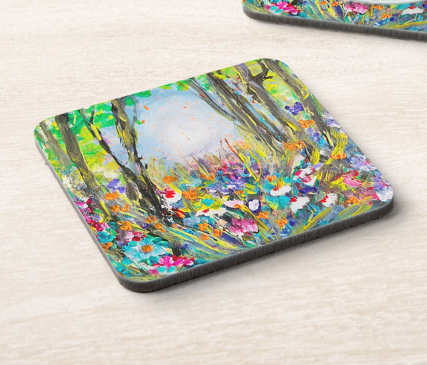 9.5x9.5cm hardboard coaster with a vibrant yellow and green wildflower painting, glossy finish, and durable cork backing.