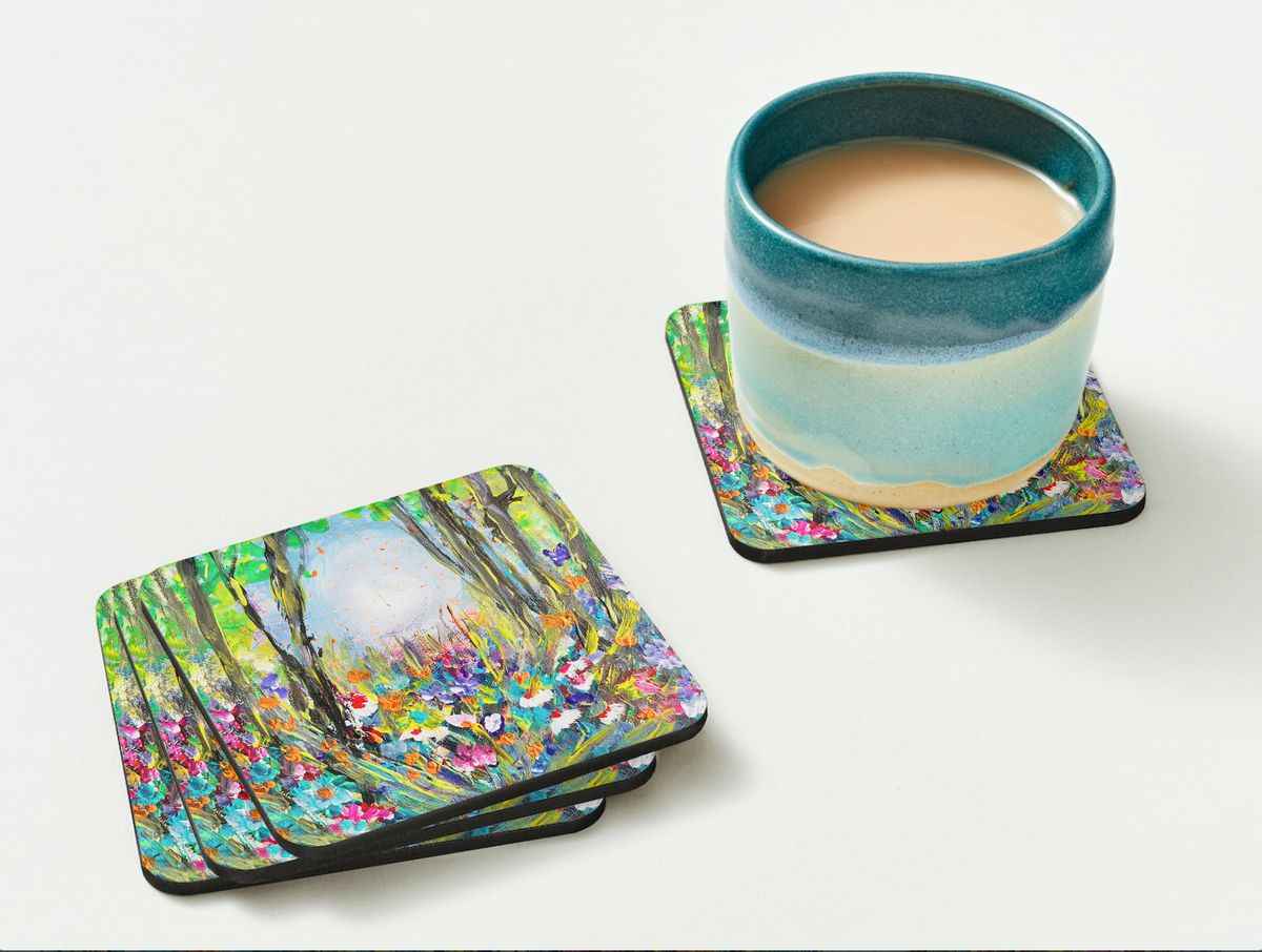 Glossy 9.5cm hardboard coaster set featuring a vibrant yellow and green wildflower painting with a cork backing.