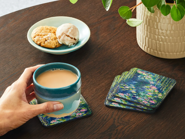 Square 9.5cm hardboard coaster featuring a vibrant Waterlily Pond acrylic painting with a glossy, heat-resistant finish.