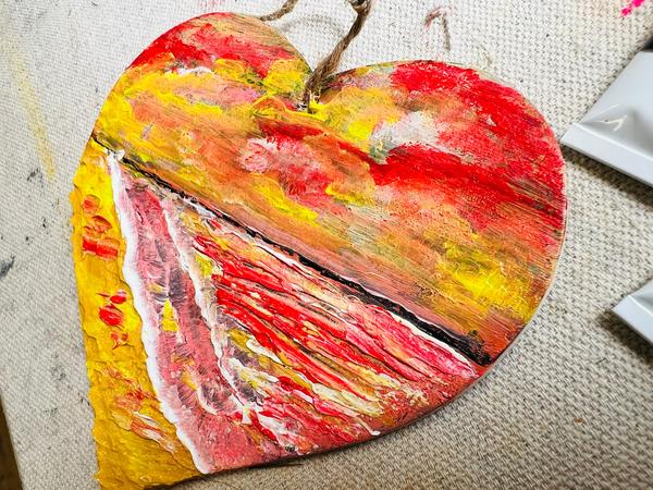 Hanging heart art decoration, multicolor abstract red-yellow brushstrokes with textured ridges