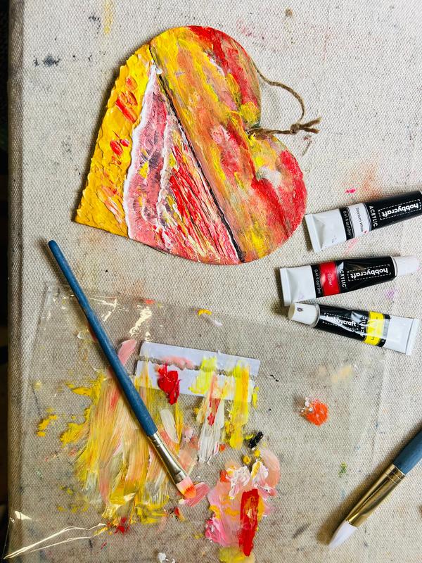 Small hanging heart art decoration, textured red yellow and pink abstract layers, jute loop.
