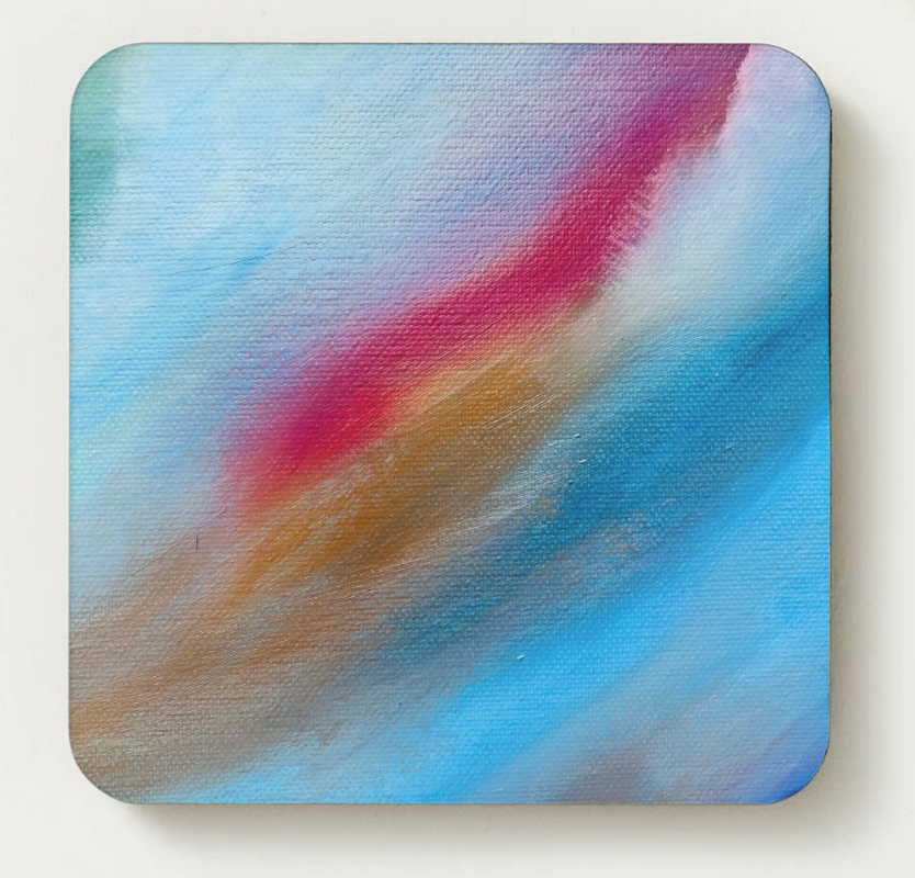 Hardboard coaster with textured blue and pink abstract wave stripe artwork, rounded square