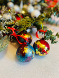 HAND PAINTED CERAMIC CHRISTMAS BAUBLE WITH GILDED GOLD LEAF
