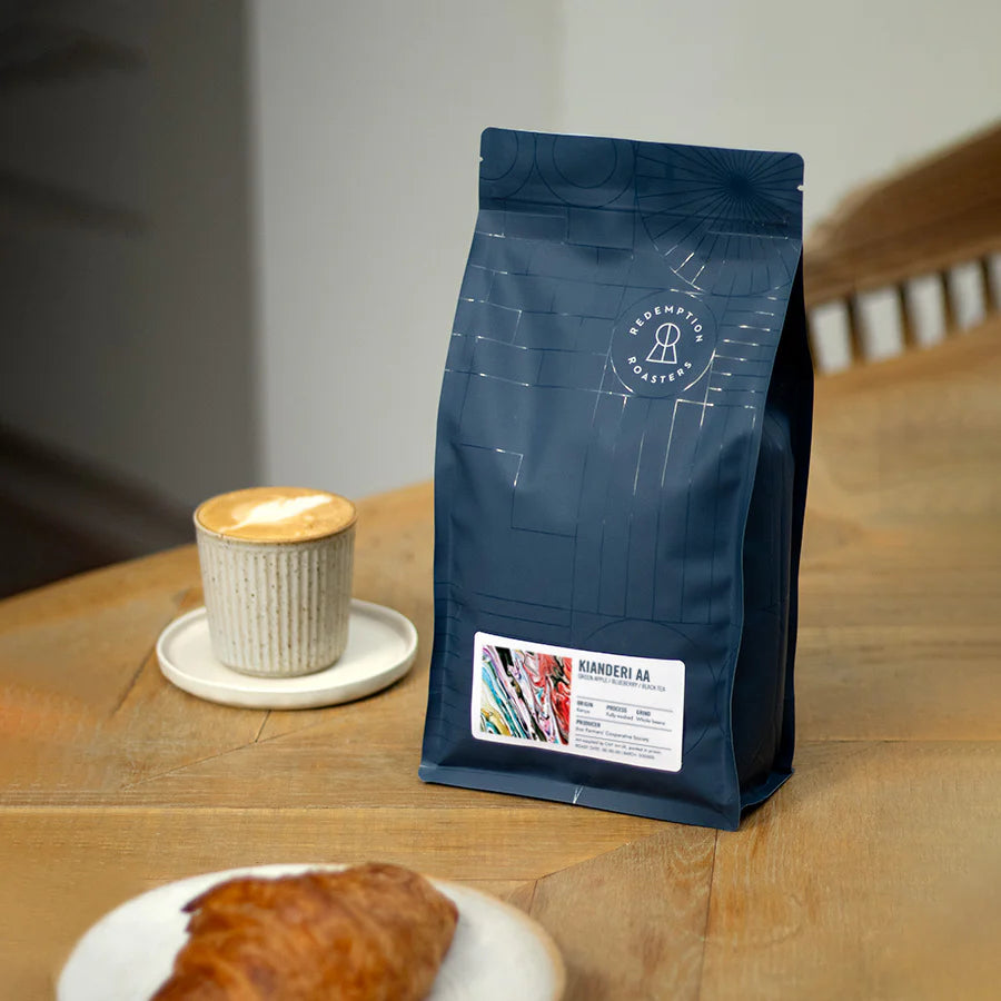 Dark blue coffee bean pouch with front label, stand-up bag