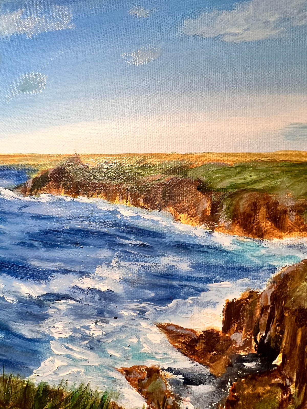 Coastal seascape painting with shoreline cliffs and blue water waves