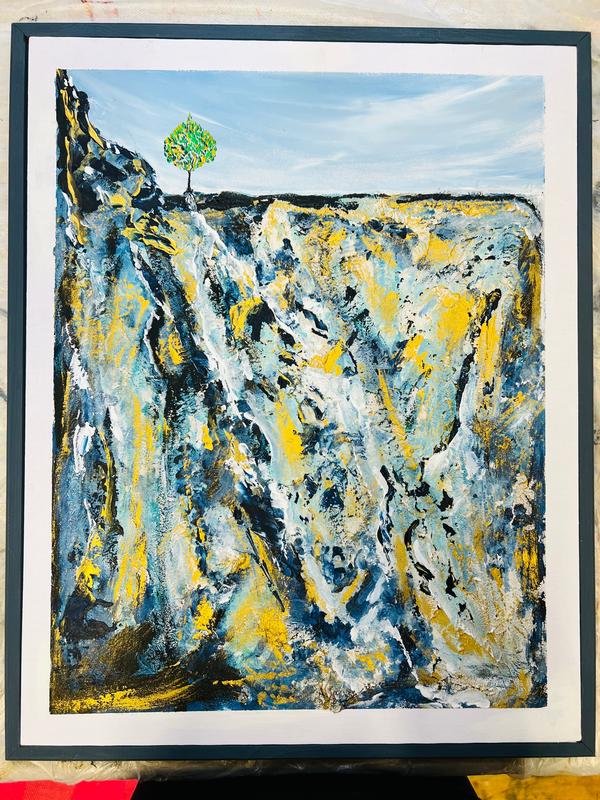 Framed textured abstract wall art with green tree, blue drips, and yellow highlights