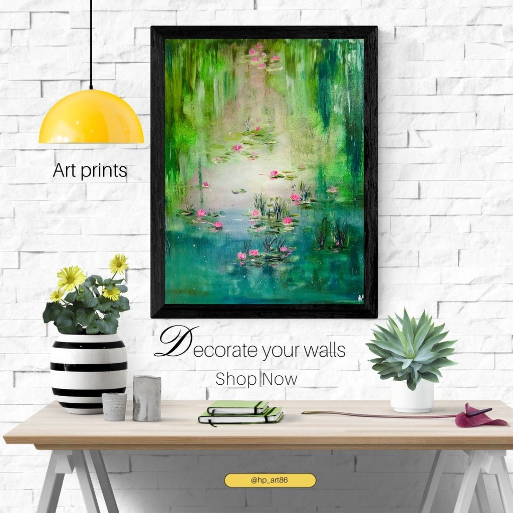 Framed abstract water lily lagoon print in black frame, green and pink palette
