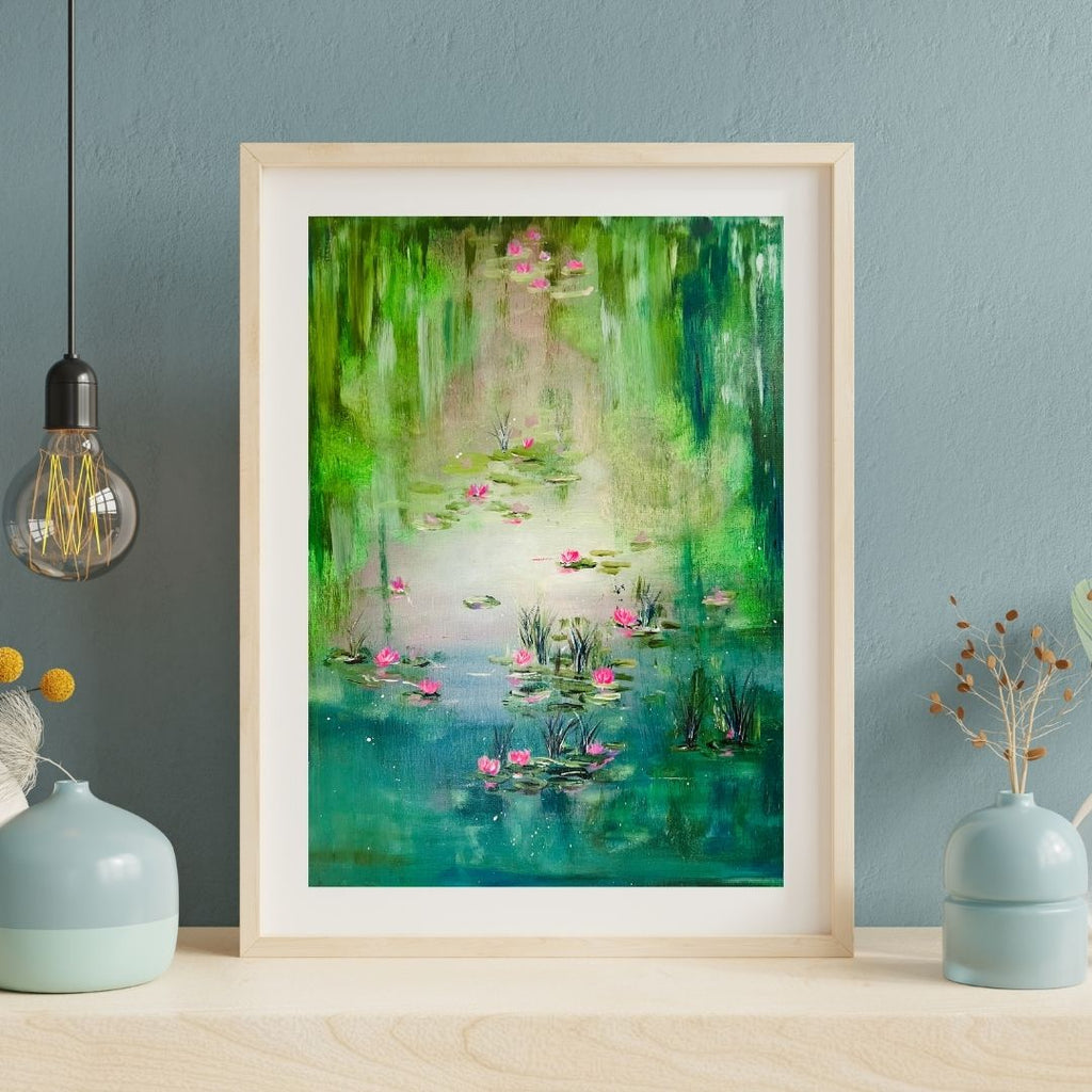 Abstract water lily lagoon artwork in light wooden frame with green and pink blooms