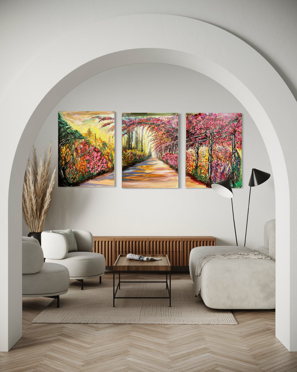 Trio framed floral landscape prints displayed on a wall niche, colorful garden path scenery