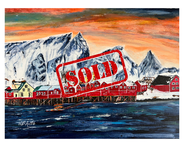 Landscape wall art print marked with red SOLD stamp over snowy mountains and red houses