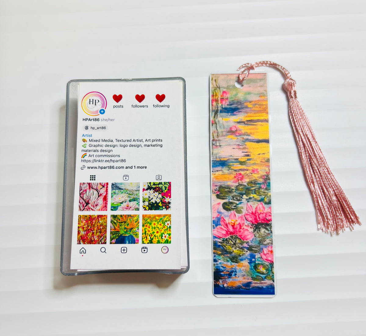 Metal bookmark with colorful landscape watercolor design and pink tassel