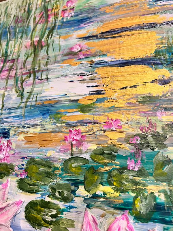 Framed textured artwork with pink flowers, green lily pads, and golden orange reflections