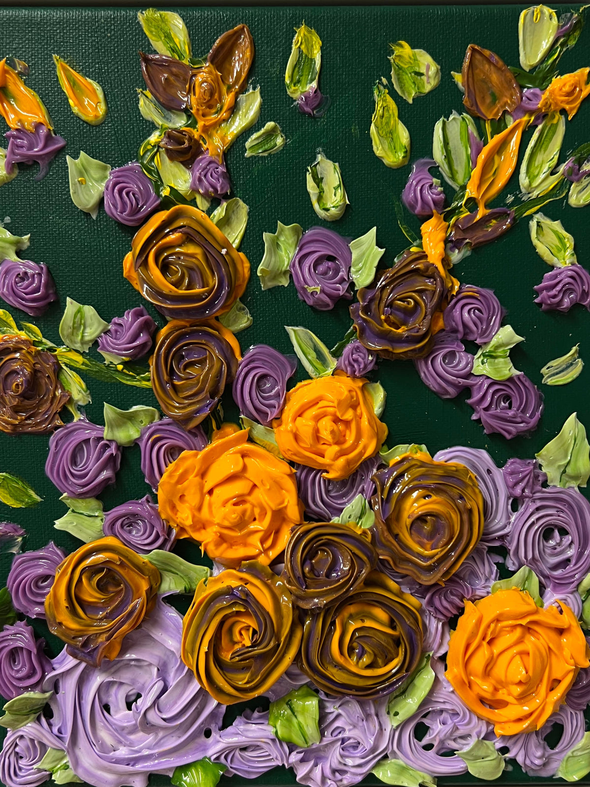 Textured rose wall art with purple and golden rosettes, orange blooms, and scattered green leaf shapes