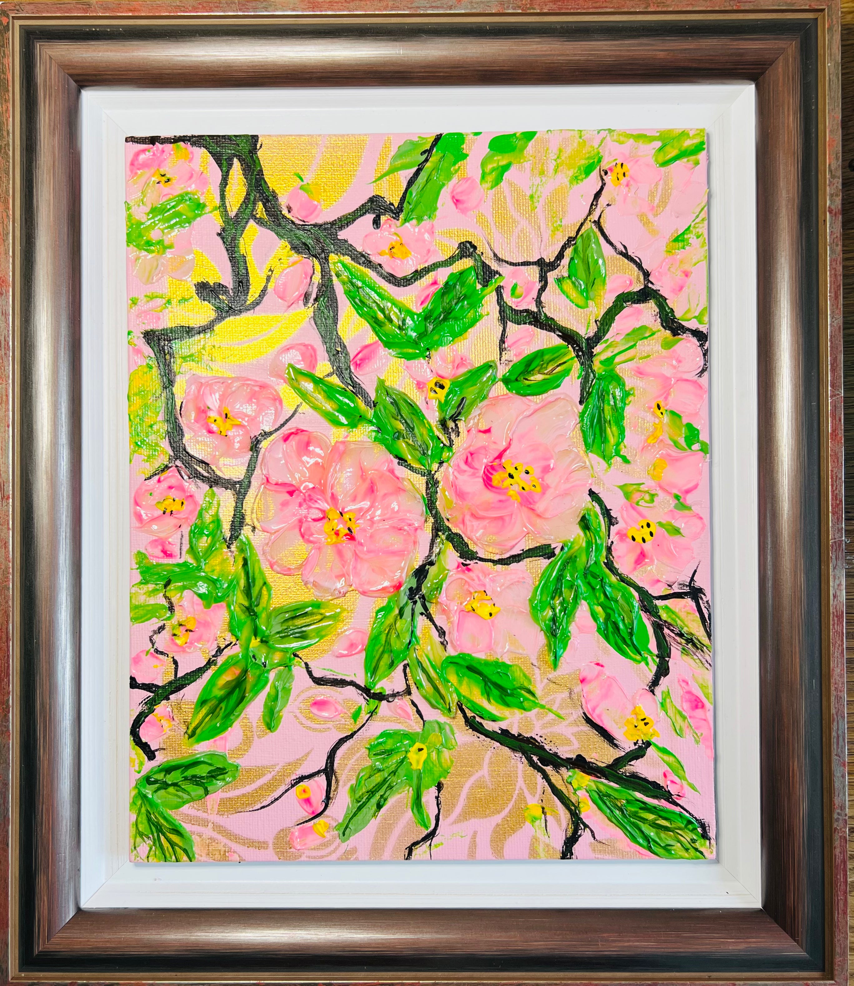 Framed cherry blossom painting in pink, green, and yellow with textured brushwork
