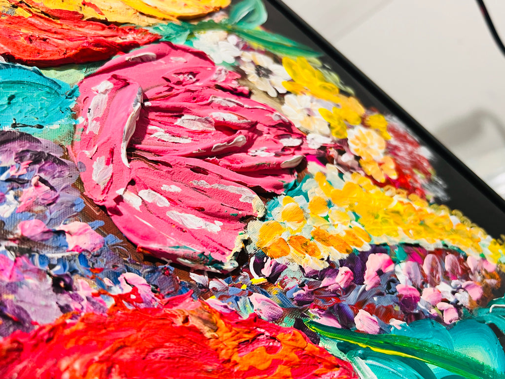 Framed mixed media floral artwork close-up with pink and orange textured petals