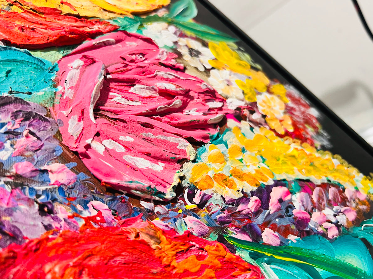 Framed mixed media floral artwork close-up with pink and orange textured petals