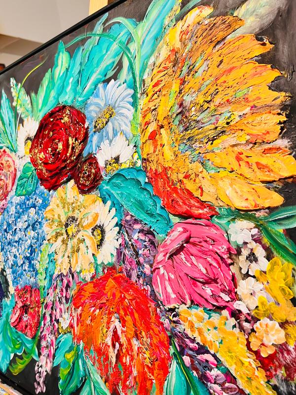 Framed mixed media floral artwork with orange, red, and turquoise layered flowers