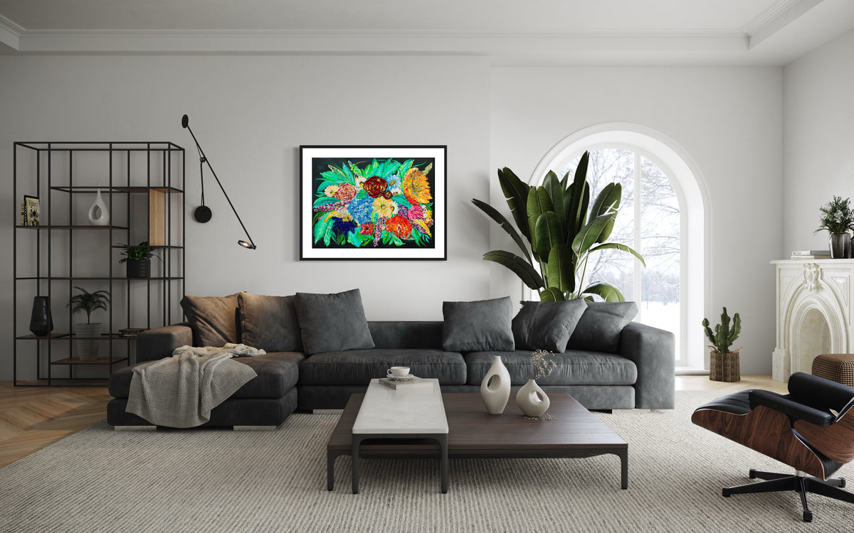 Framed floral mixed media artwork centered on a living room wall with bright multicolor blooms