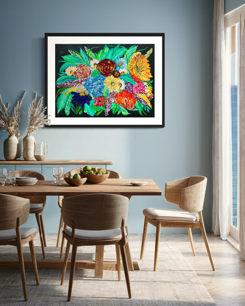 Framed floral mixed media wall art with vivid multicolor blossoms above a dining table